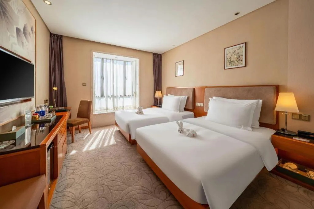 Bed in Expo Garden Hotel