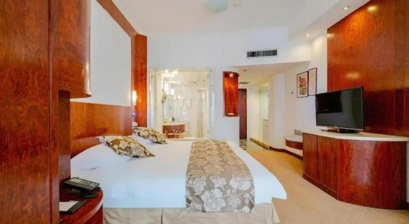 Bed in Expo Garden Hotel