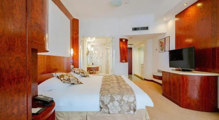 Bed in Expo Garden Hotel