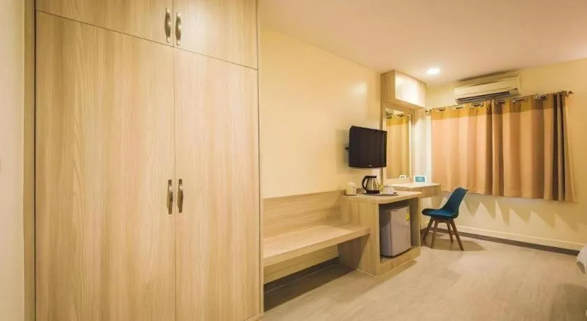 Bed in New Suanmali Hotel