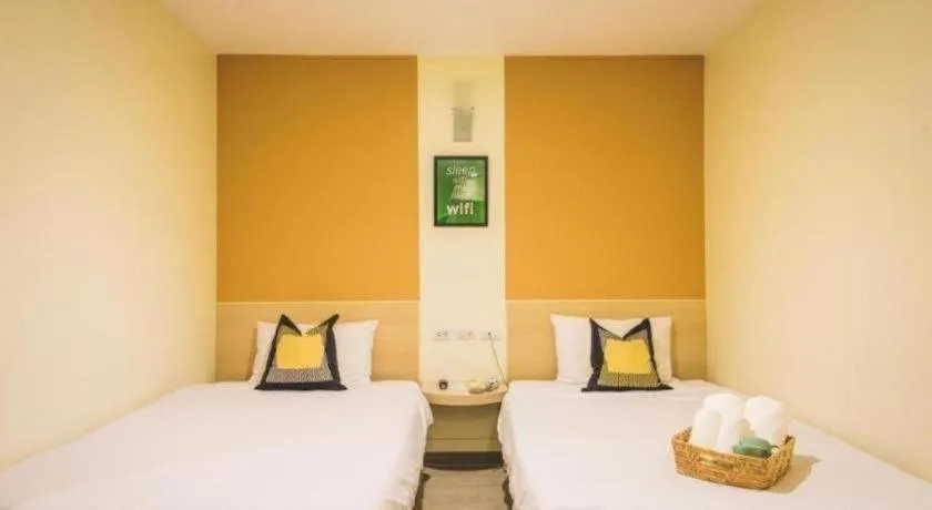 Bed in New Suanmali Hotel