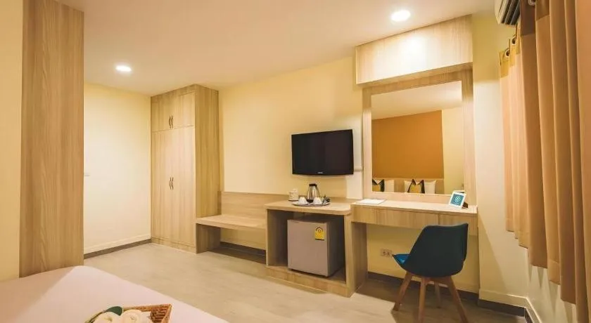 Bed in New Suanmali Hotel