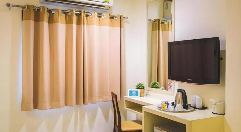 Bed in New Suanmali Hotel