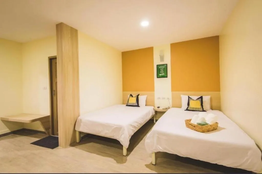 Bed in New Suanmali Hotel