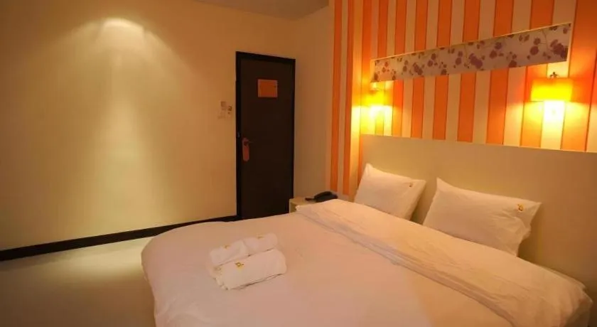 Bed in Ido Boutique Suite