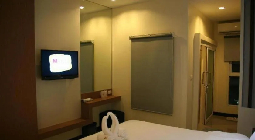 Bed in Ido Boutique Suite