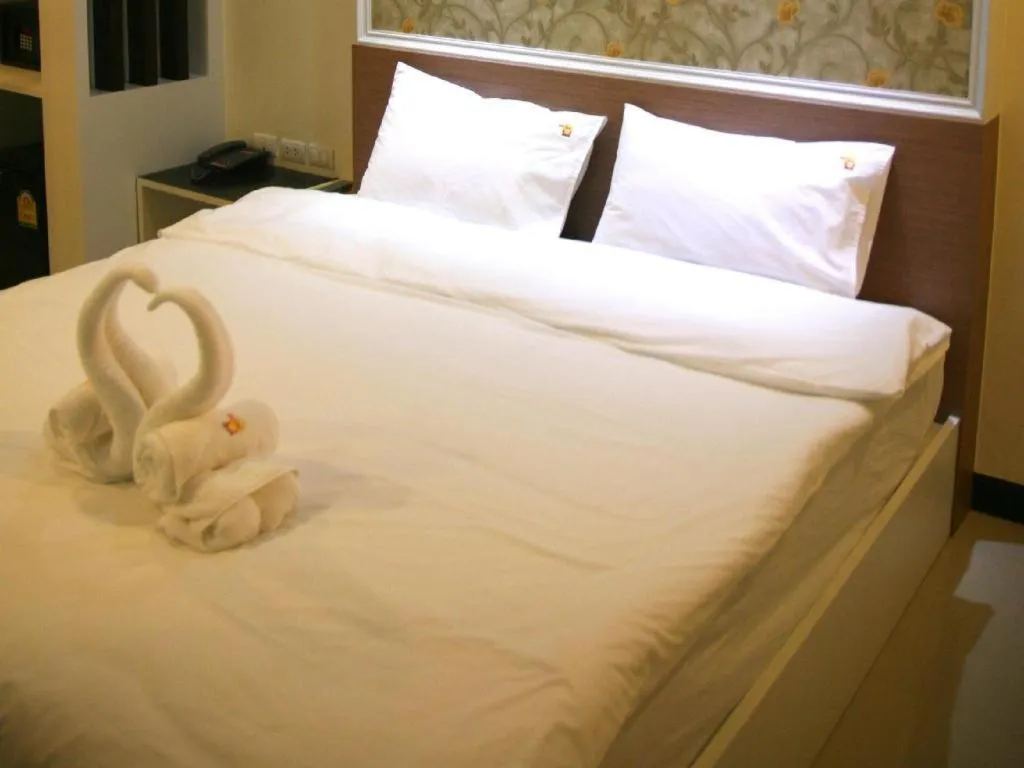 Bed in Ido Boutique Suite