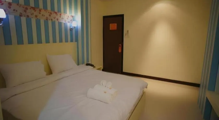 Bed in Ido Boutique Suite