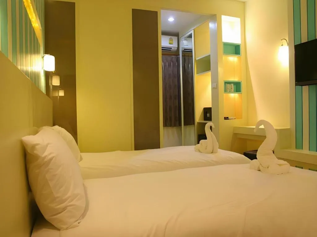 Bed in Ido Boutique Suite