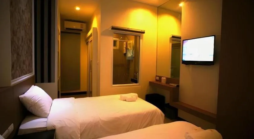 Bed in Ido Boutique Suite