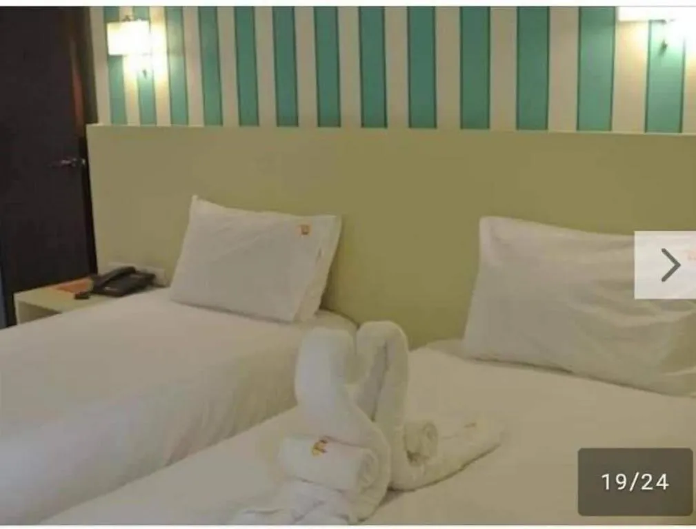 Bed in Ido Boutique Suite