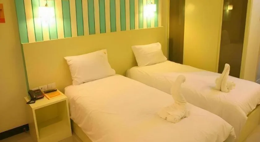 Bed in Ido Boutique Suite