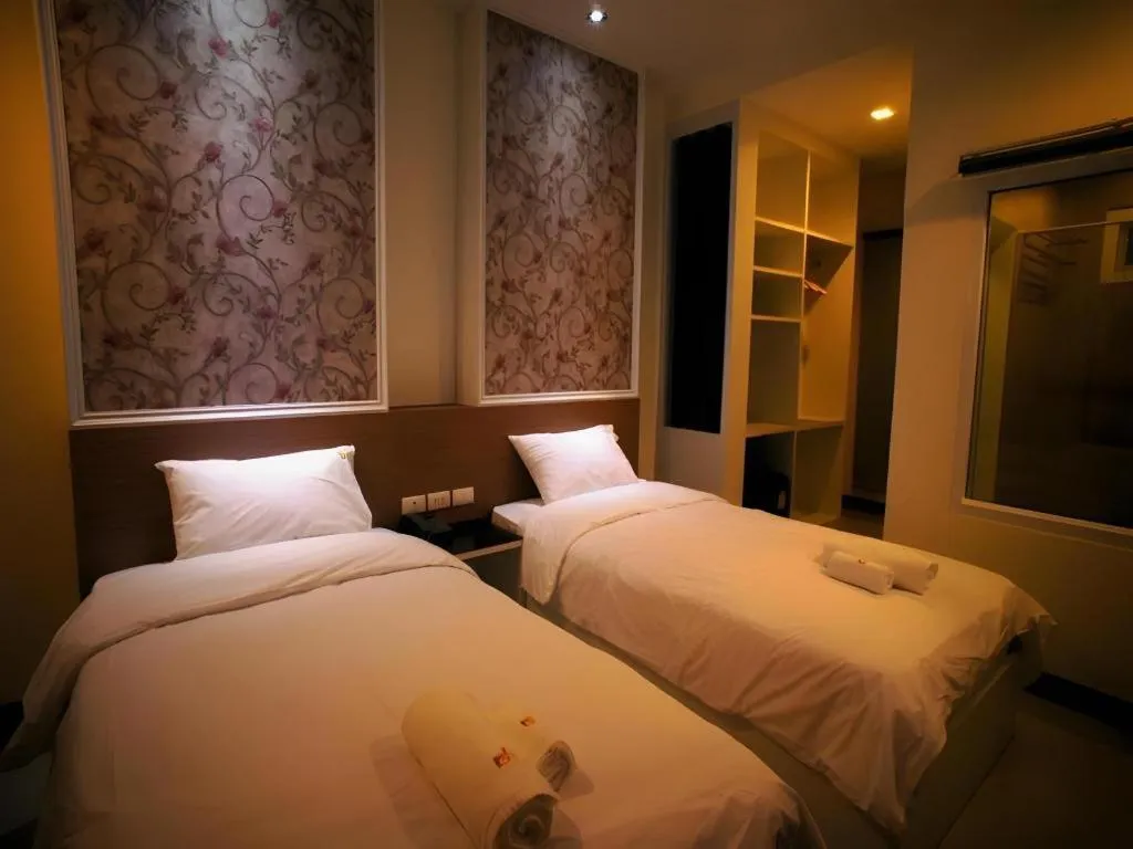 Bed in Ido Boutique Suite