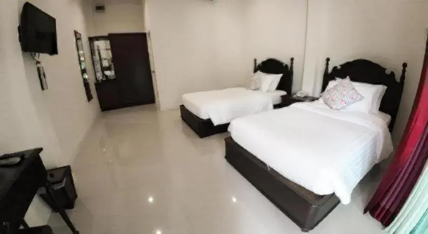 Bed in Ruen Maihom Riverside Cottage Bed in Ruen Maihom Riverside Cottage