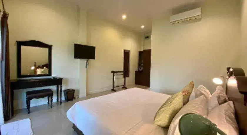 Bed in Ruen Maihom Riverside Cottage Bed in Ruen Maihom Riverside Cottage