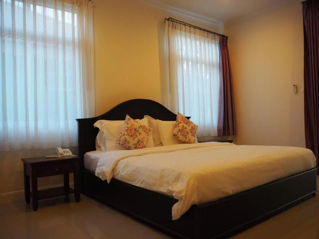 Bed in Ruen Maihom Riverside Cottage