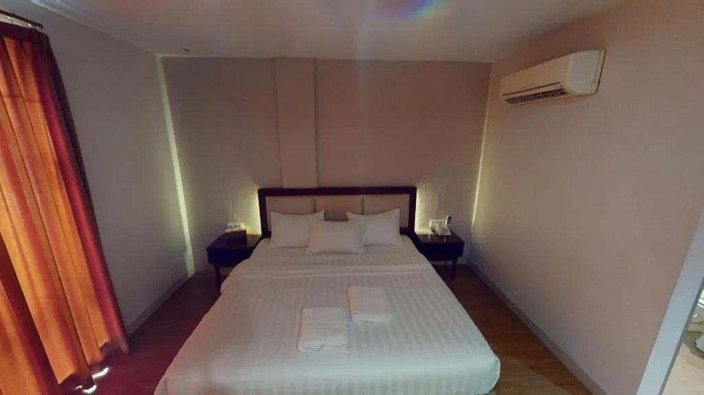 Bed in Lovina Inn Penuin Hotel