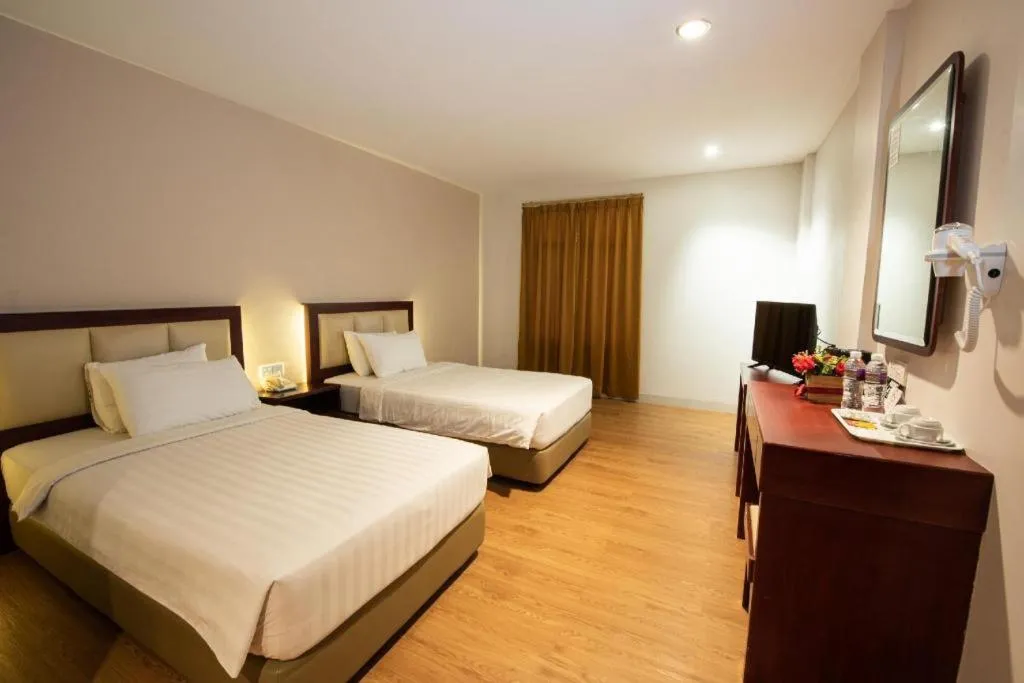 Bed in Lovina Inn Penuin Hotel