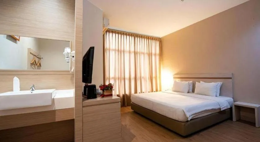 Bed in Lovina Inn Penuin Hotel