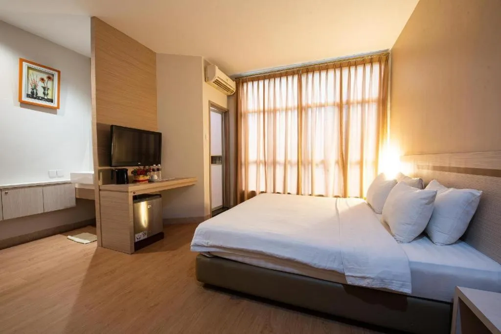 Bed in Lovina Inn Penuin Hotel