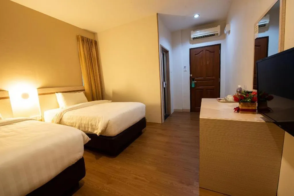 Bed in Lovina Inn Penuin Hotel