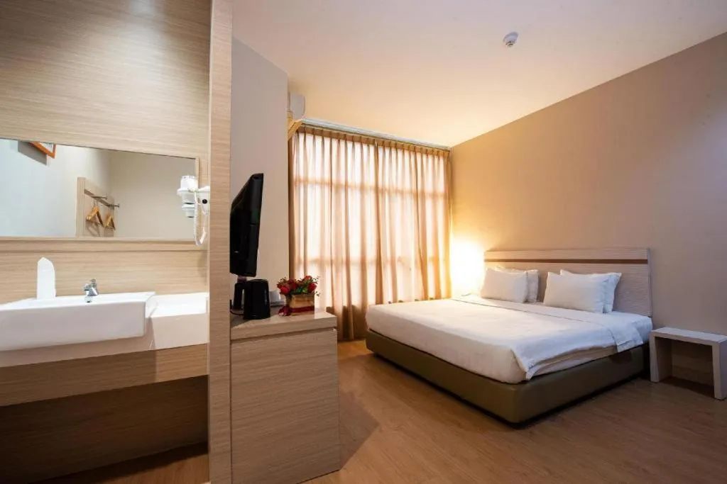 Bed in Lovina Inn Penuin Hotel