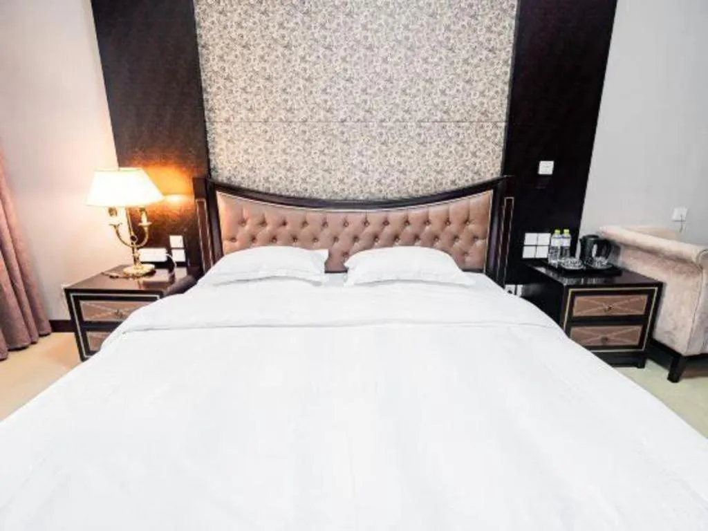 Bed in Qingdao Danube International Hotel