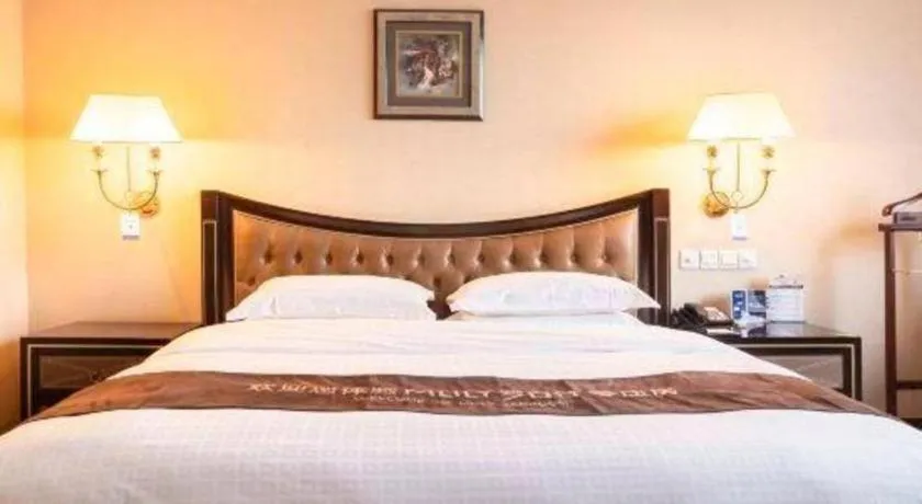 Bed in Qingdao Danube International Hotel