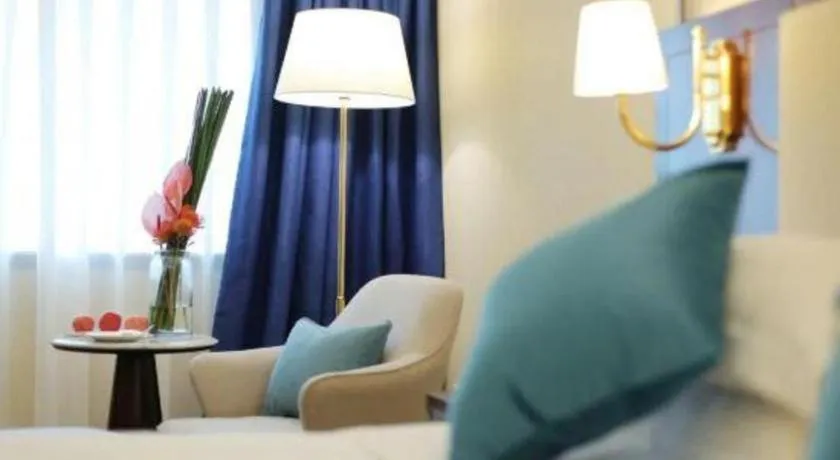 Bed in Qingdao Danube International Hotel