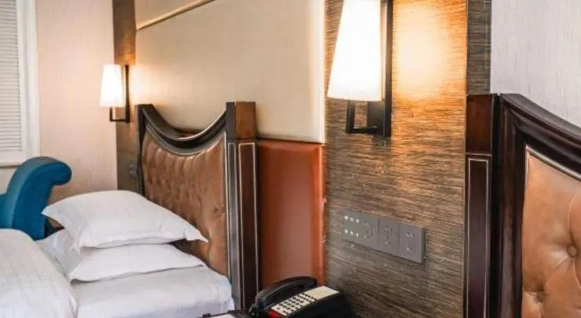 Bed in Qingdao Danube International Hotel