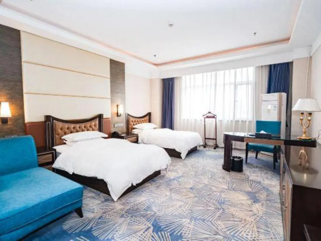 Bed in Qingdao Danube International Hotel