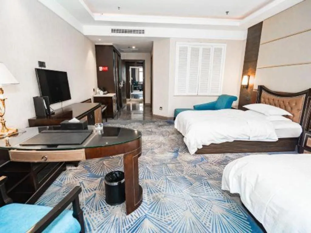 Bed in Qingdao Danube International Hotel