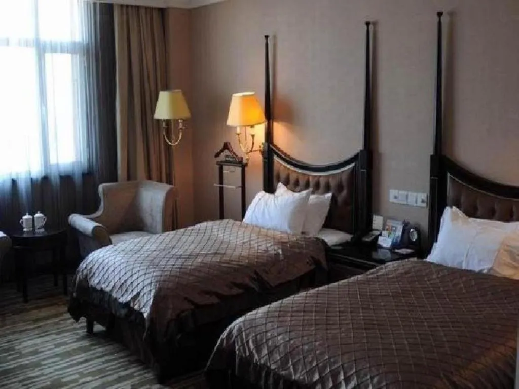 Bed in Qingdao Danube International Hotel