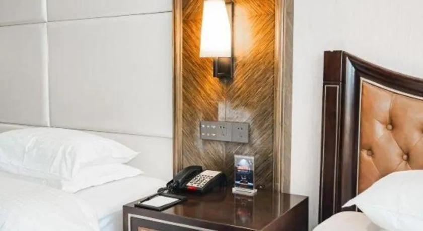 Bed in Qingdao Danube International Hotel