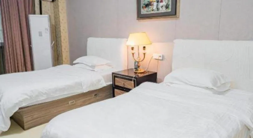 Bed in Qingdao Danube International Hotel