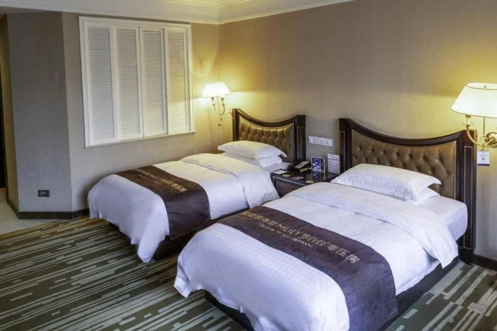 Bed in Qingdao Danube International Hotel