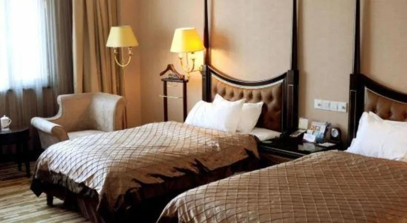 Bed in Qingdao Danube International Hotel