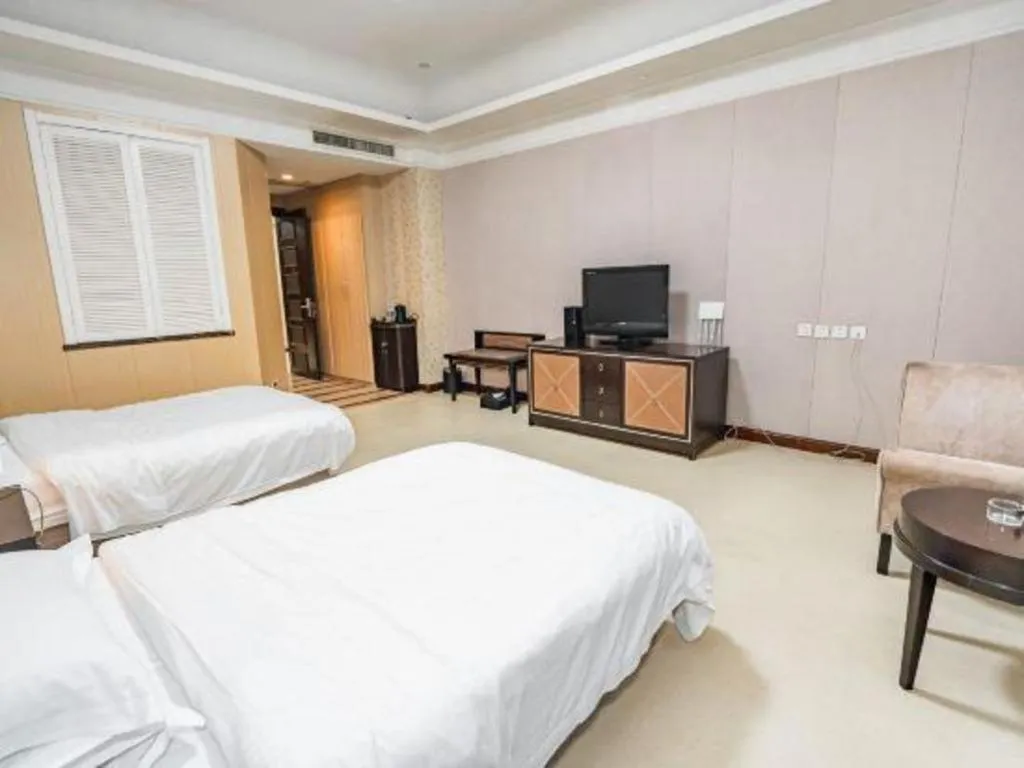 Bed in Qingdao Danube International Hotel