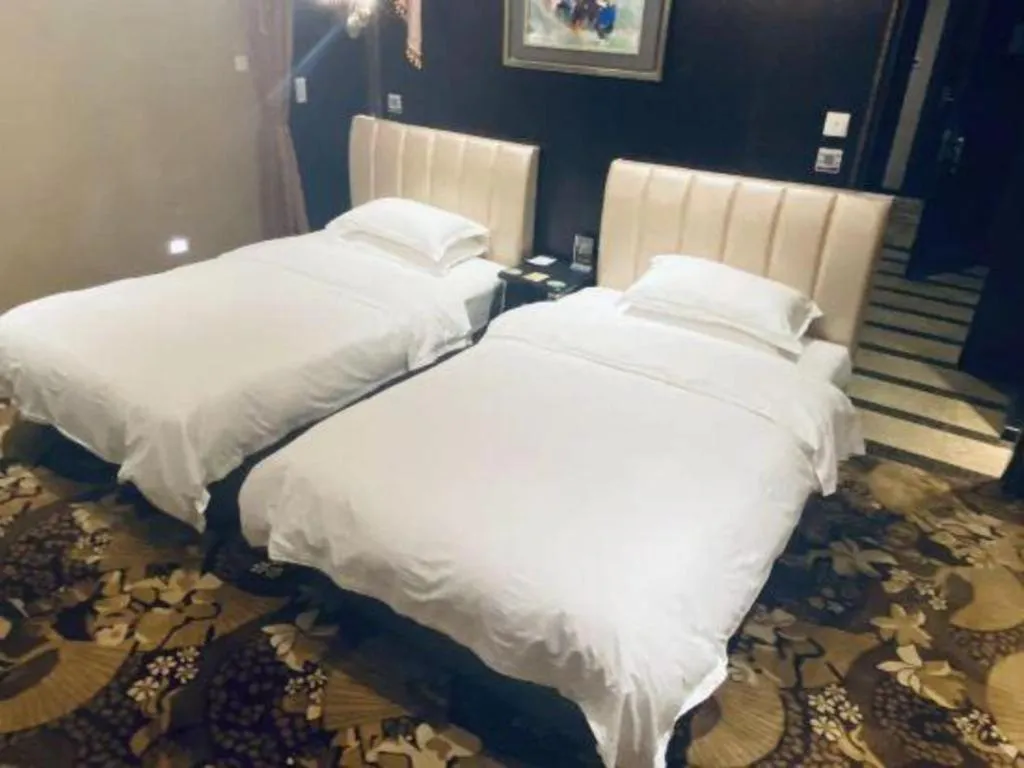 Bed in Qingdao Danube International Hotel