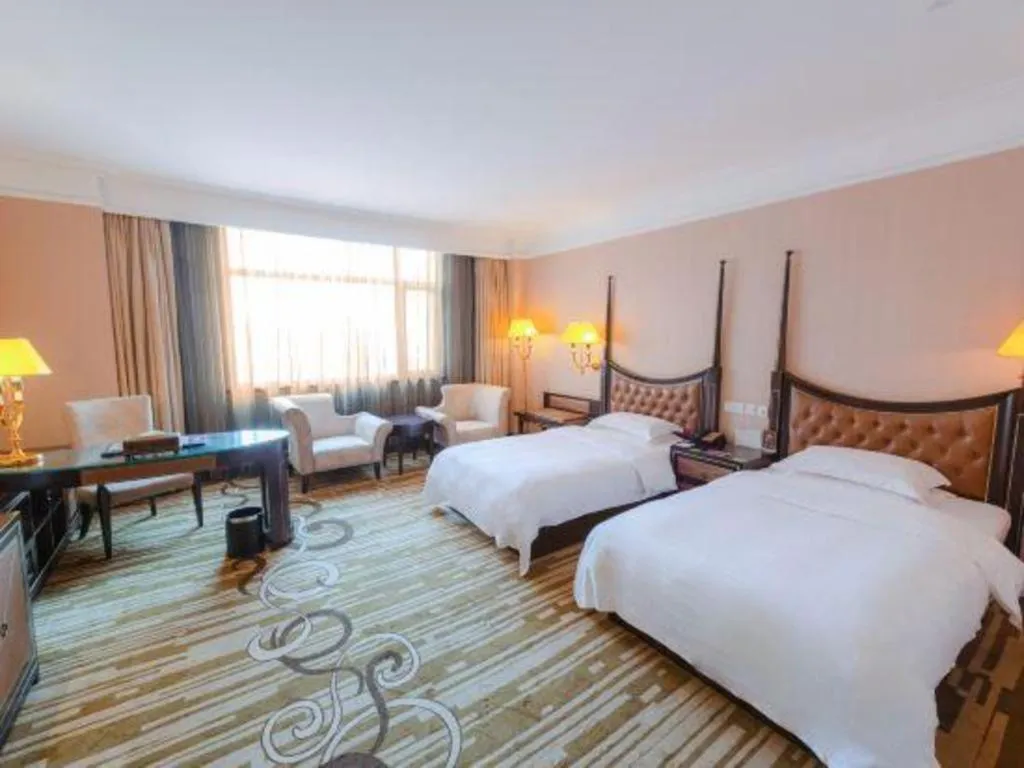 Bed in Qingdao Danube International Hotel