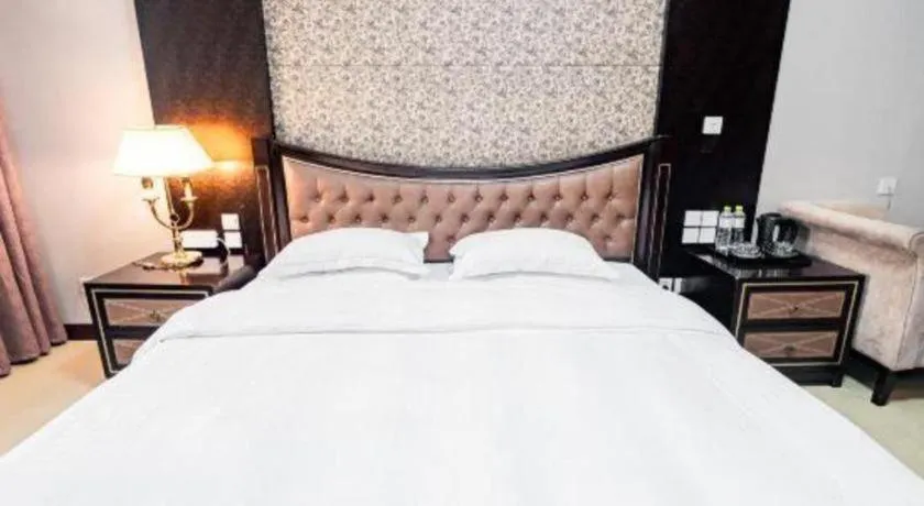 Bed in Qingdao Danube International Hotel