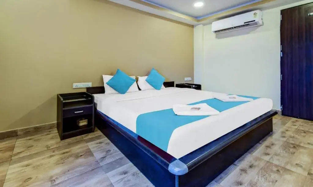 Bed in Hotel Rajdeep Inn Bed in Hotel Rajdeep Inn