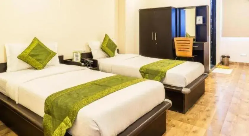 Bed in Hotel Rajdeep Inn Bed in Hotel Rajdeep Inn