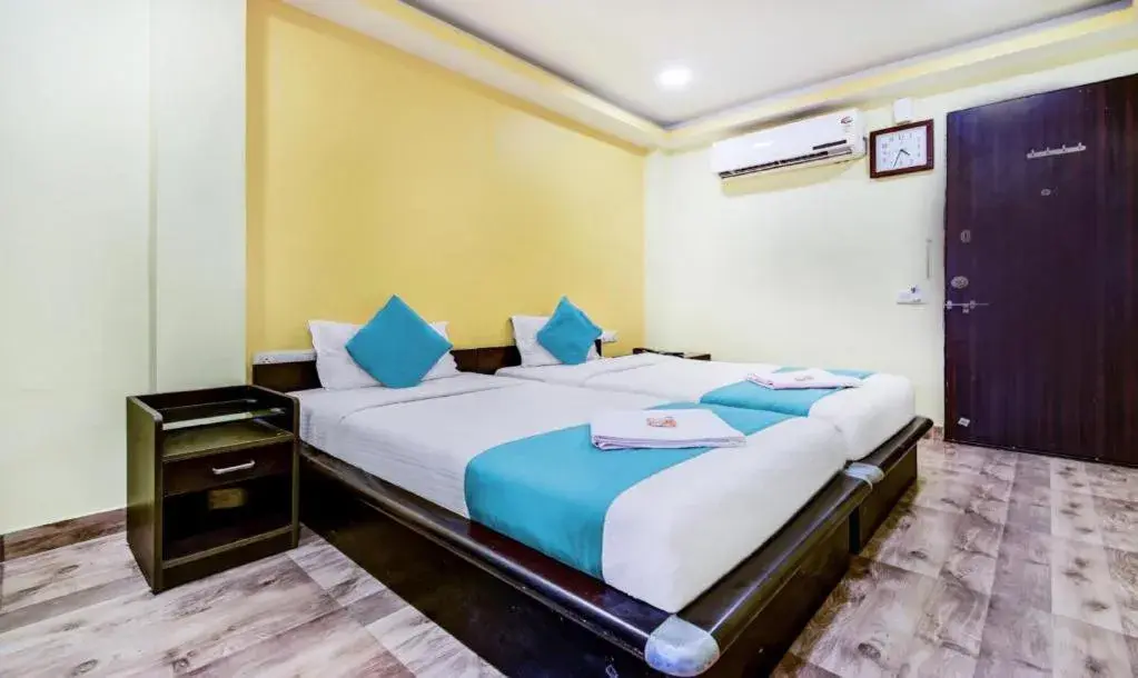 Bed in Hotel Rajdeep Inn Bed in Hotel Rajdeep Inn