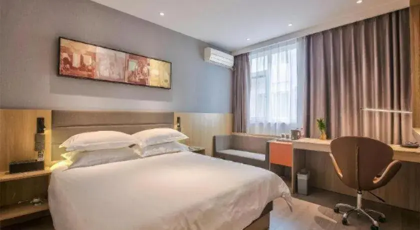 Bed in Jinjiang Inn Taizhou Huangyan Jiufeng Park Bed in Jinjiang Inn Taizhou Huangyan Jiufeng Park