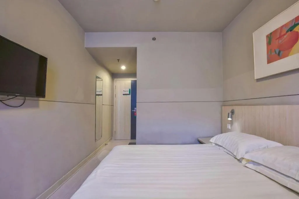 Bed in Jinjiang Inn Taizhou Huangyan Jiufeng Park