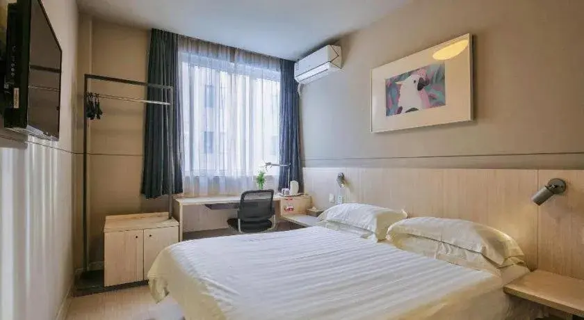 Bed in Jinjiang Inn Taizhou Huangyan Jiufeng Park Bed in Jinjiang Inn Taizhou Huangyan Jiufeng Park