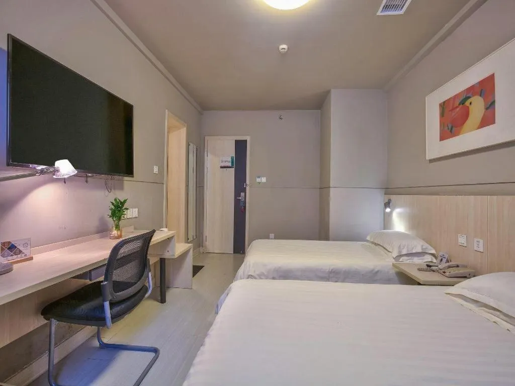 Bed in Jinjiang Inn Taizhou Huangyan Jiufeng Park