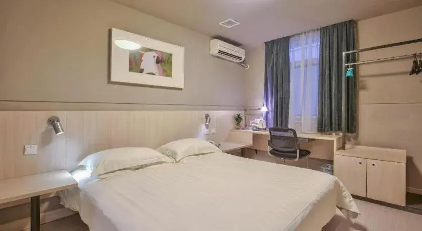 Bed in Jinjiang Inn Taizhou Huangyan Jiufeng Park Bed in Jinjiang Inn Taizhou Huangyan Jiufeng Park