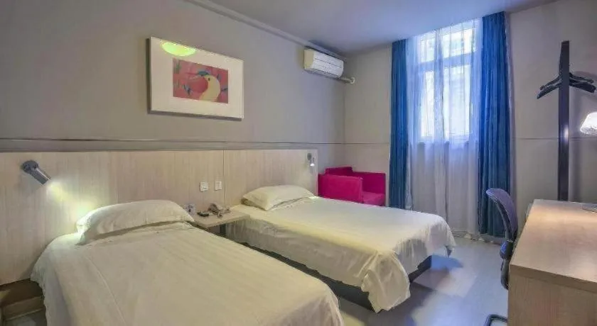 Bed in Jinjiang Inn Taizhou Huangyan Jiufeng Park